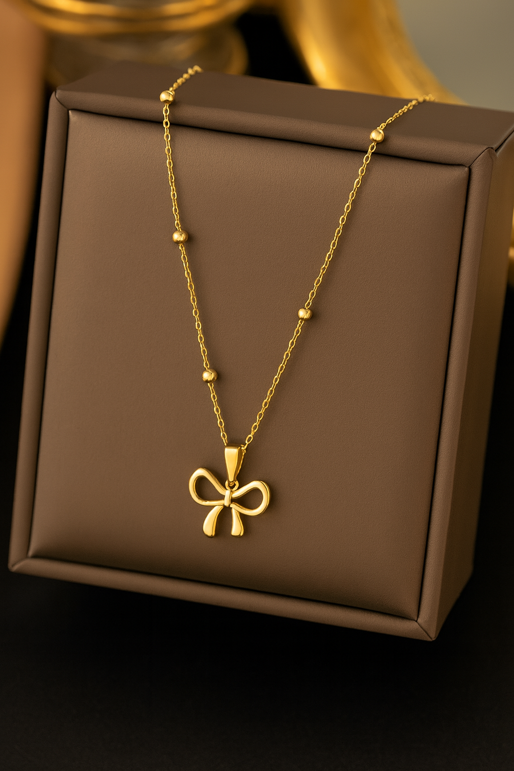 Gold-Plated Anti Tarnish Stainless Steel Infinity Bow Pendant