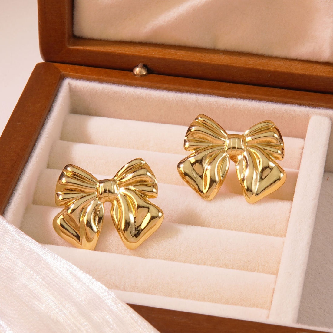 Wrapped with gold bow earrings